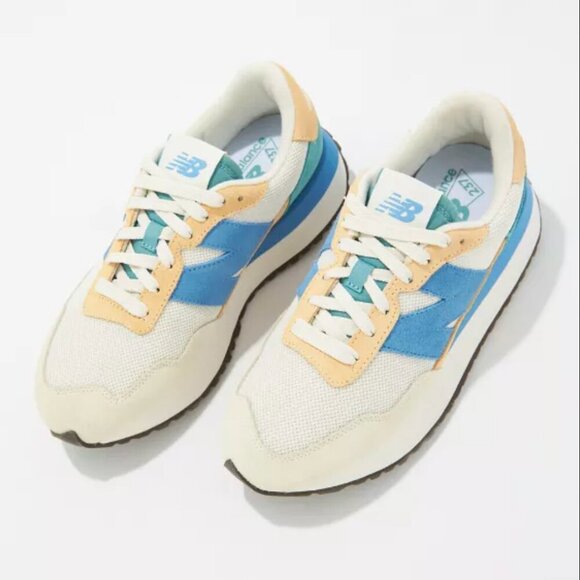 New Balance Women's 237 Sneaker with Peach/Blue/Cream colors, size 9 - Picture 11 of 11
